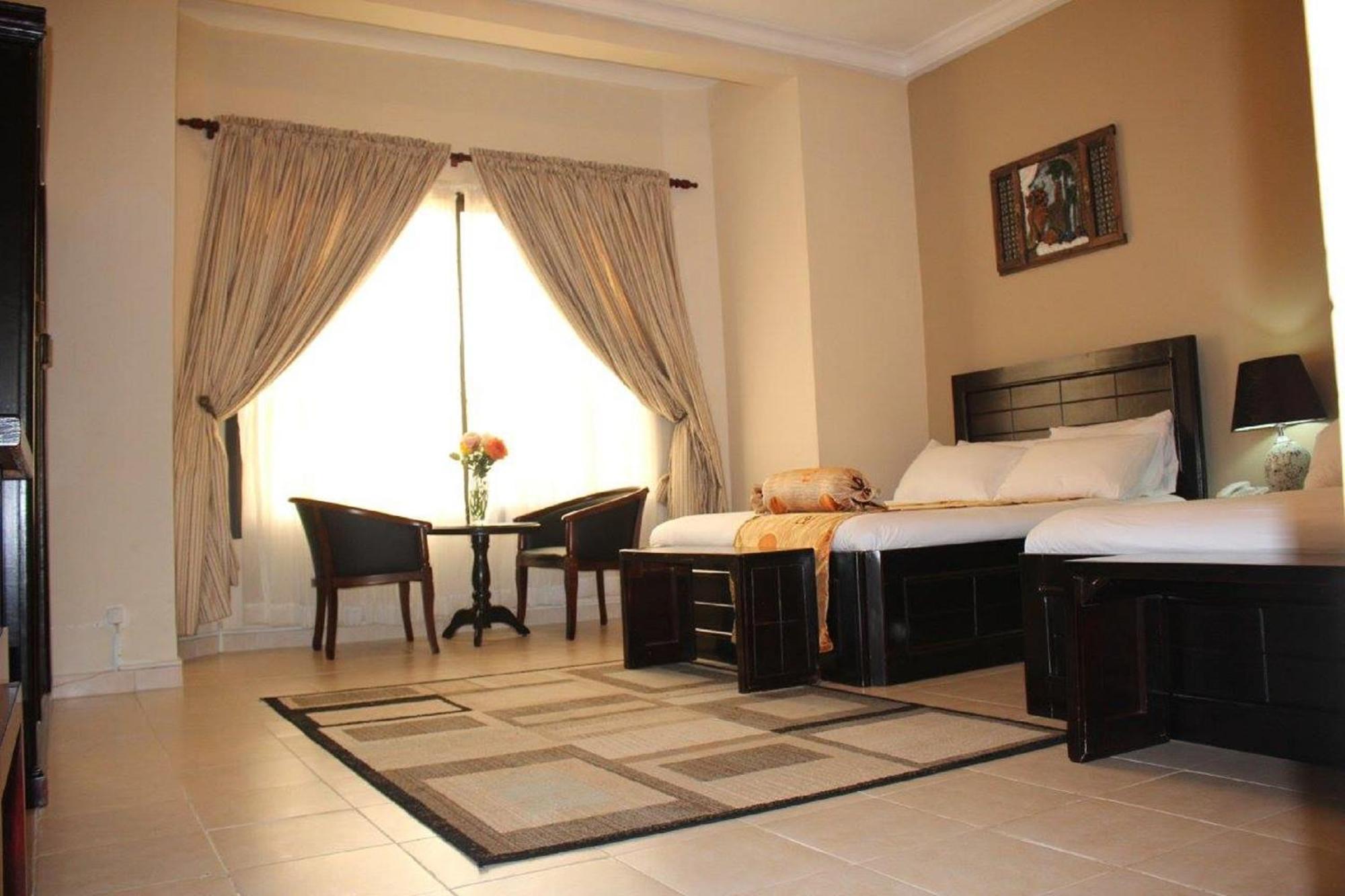 Palm Spring Resort مونروفيا المظهر الخارجي الصورة